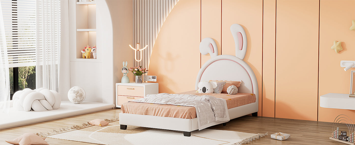 twin size upholstered leather platform bed with rabbit ornament, white