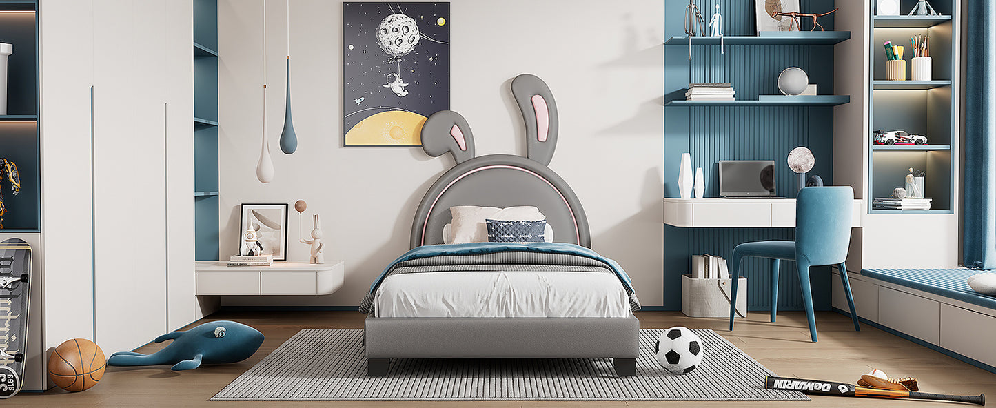 upholstered leather platform bed with rabbit ornament, gray