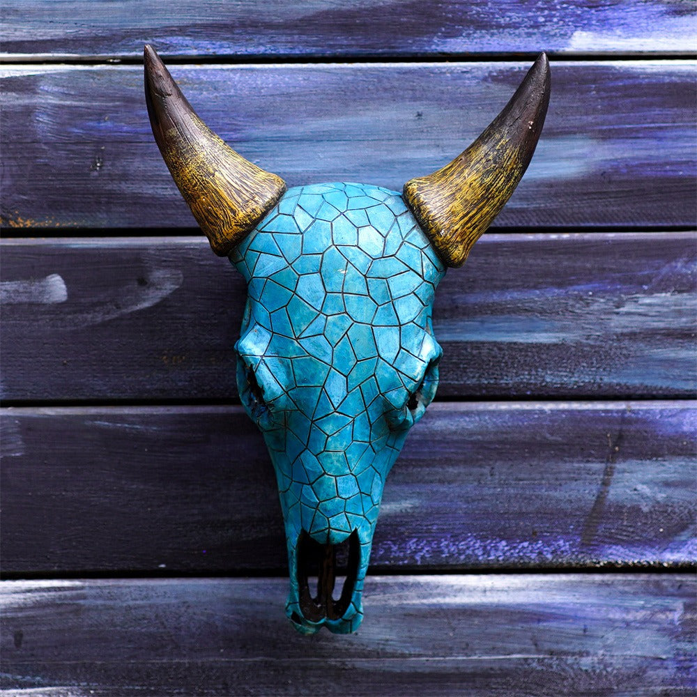 pointed cow head bone wall ornament