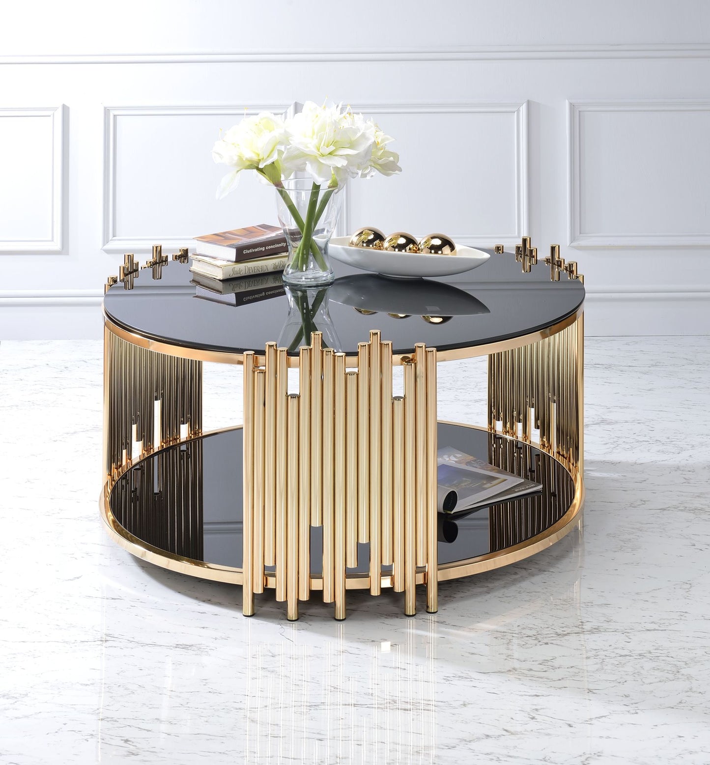 acme tanquin coffee table in gold & black glass