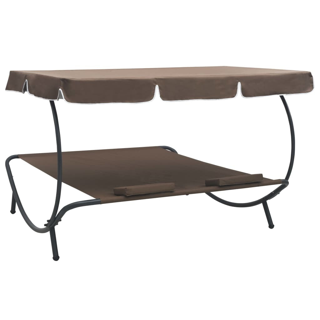 patio lounge bed with canopy and pillows brown