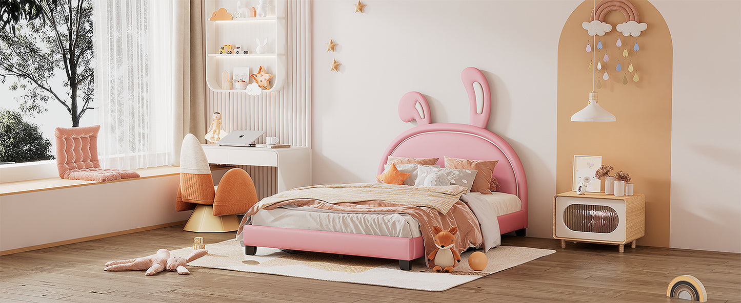 upholstered leather platform bed with rabbit ornament, pink