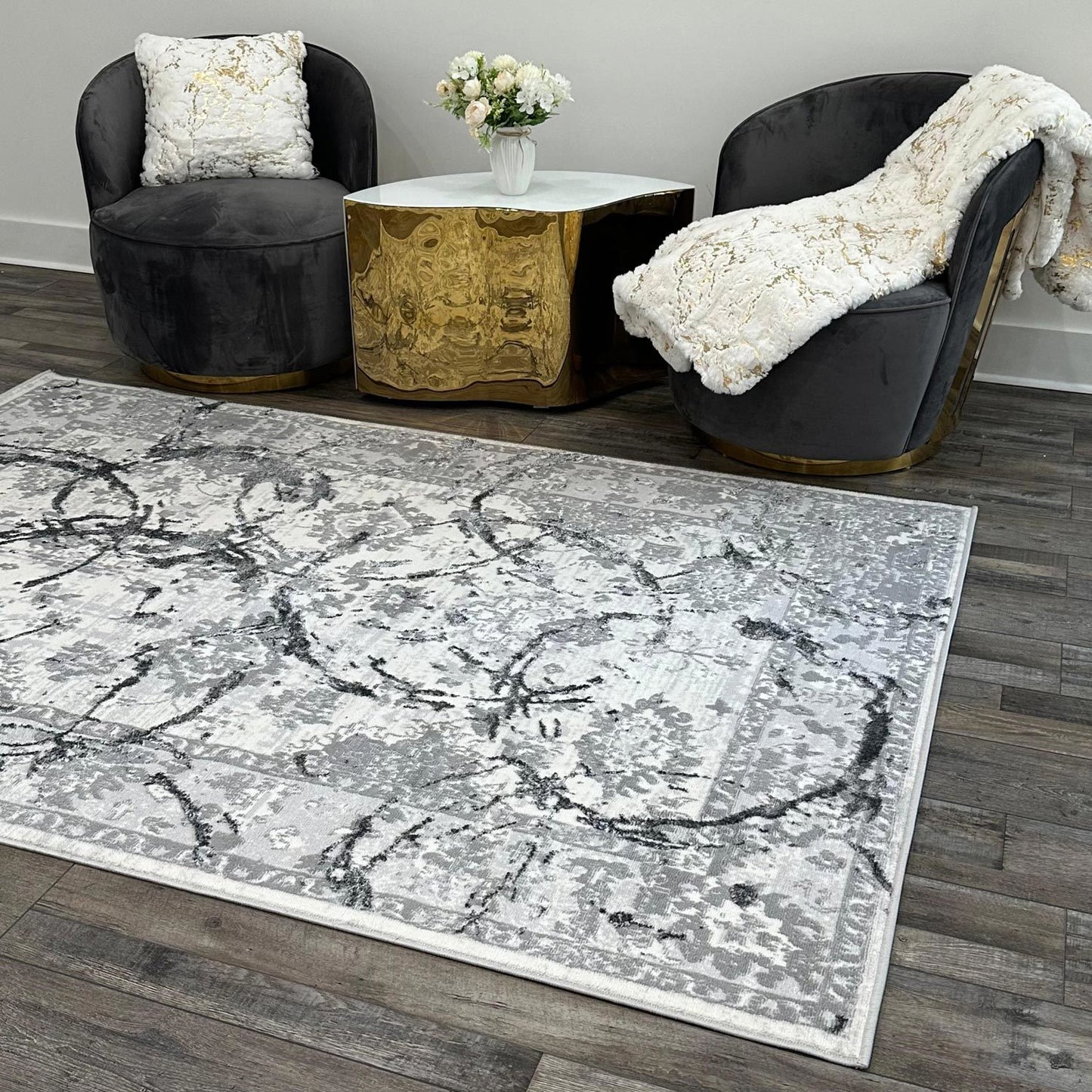 penina luxury area rug in gray with silver circles abstract design