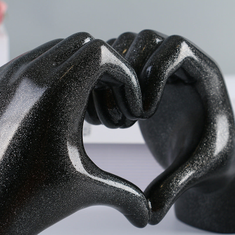 nordic heart gesture sculpture