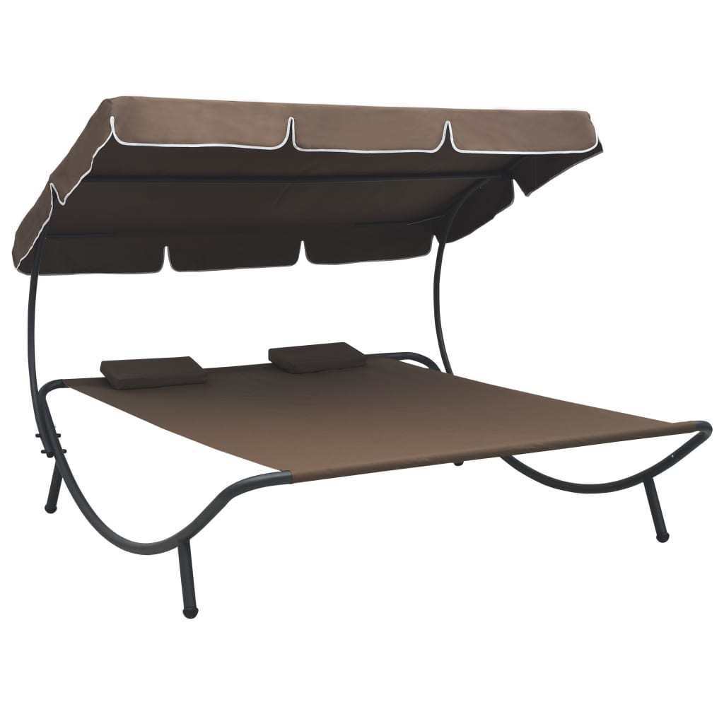 patio lounge bed with canopy and pillows brown
