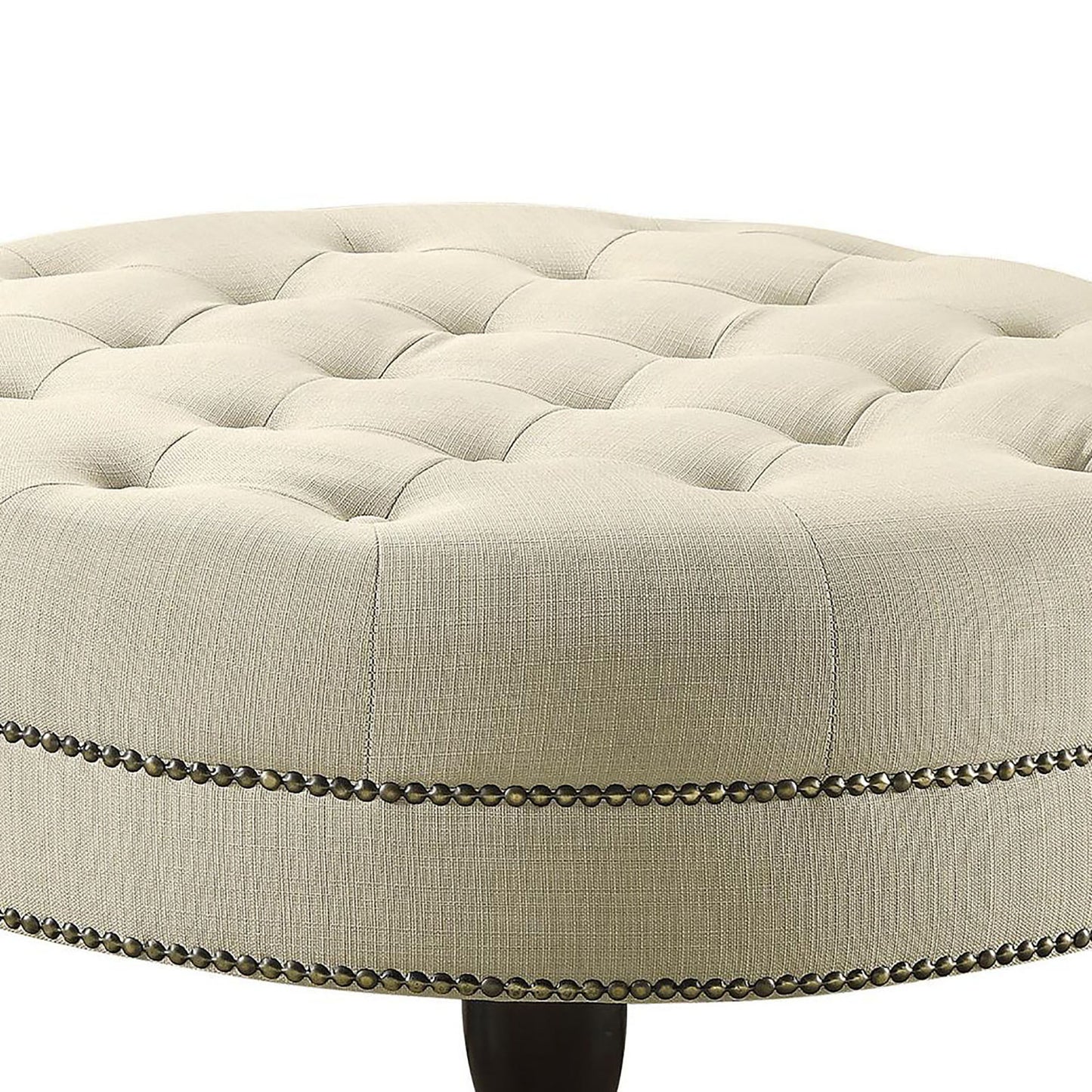oatmeal cocktail ottoman with nailhead trim