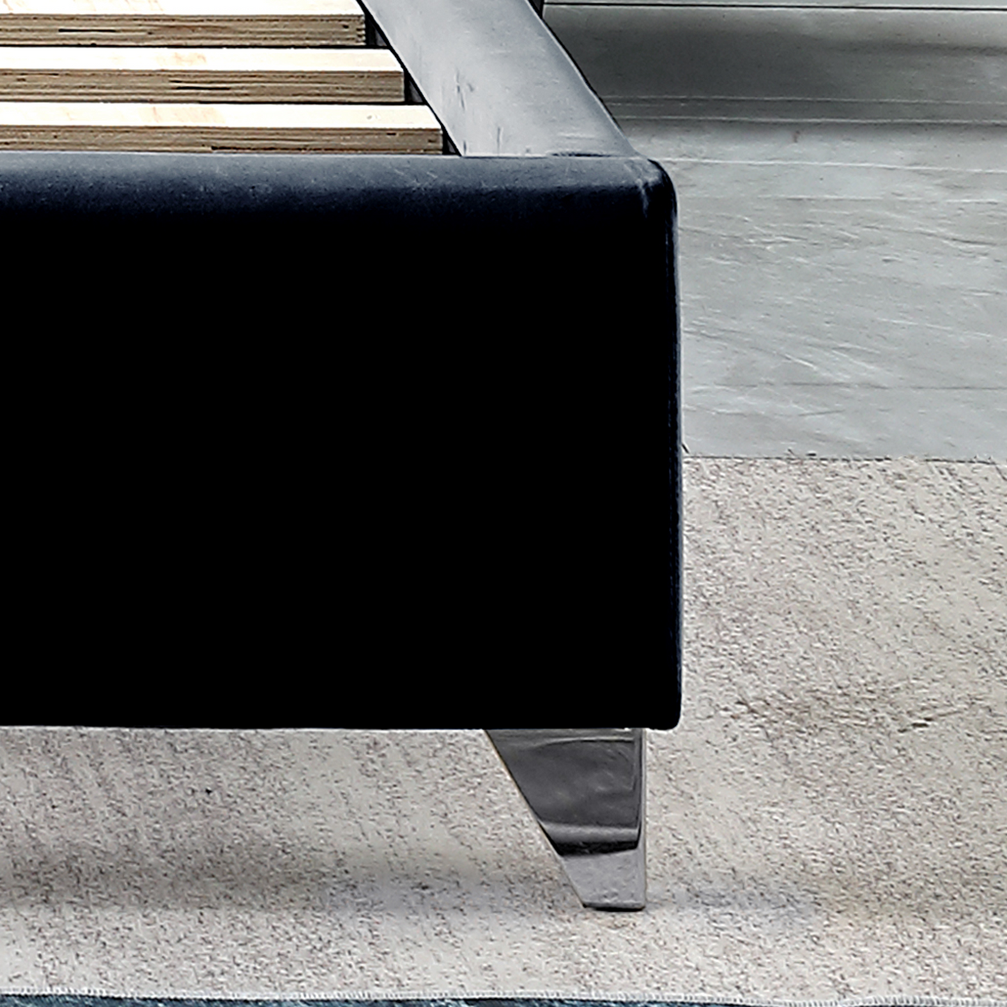 velvet upholstered bed with deep button tufting, black