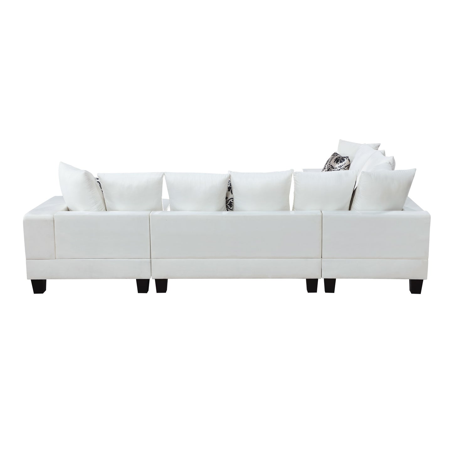 elegant velvet corner couch with lots of pillows