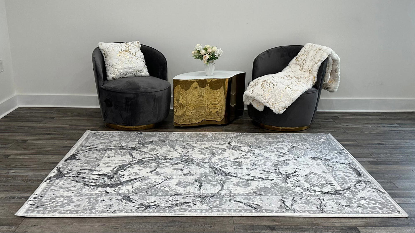 penina luxury area rug in gray with silver circles abstract design