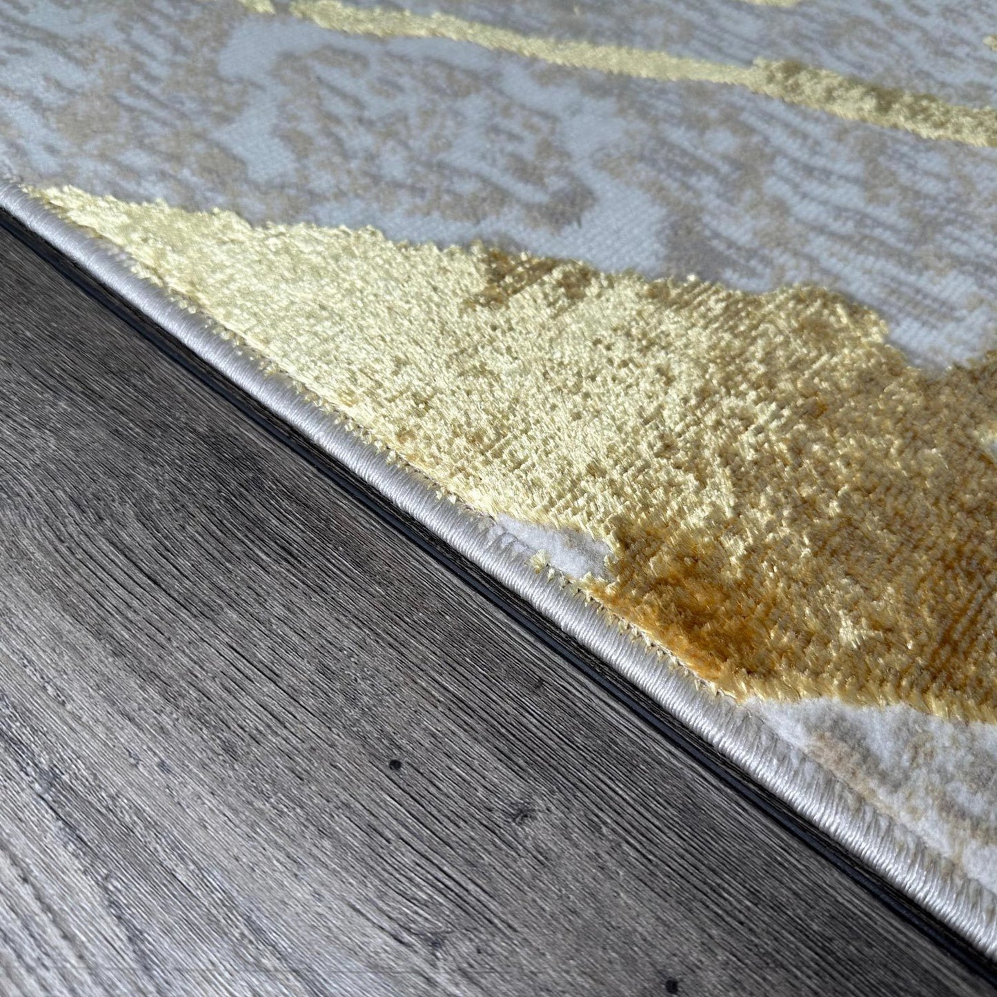 shifra luxury area rug in beige and gray with gold abstract design