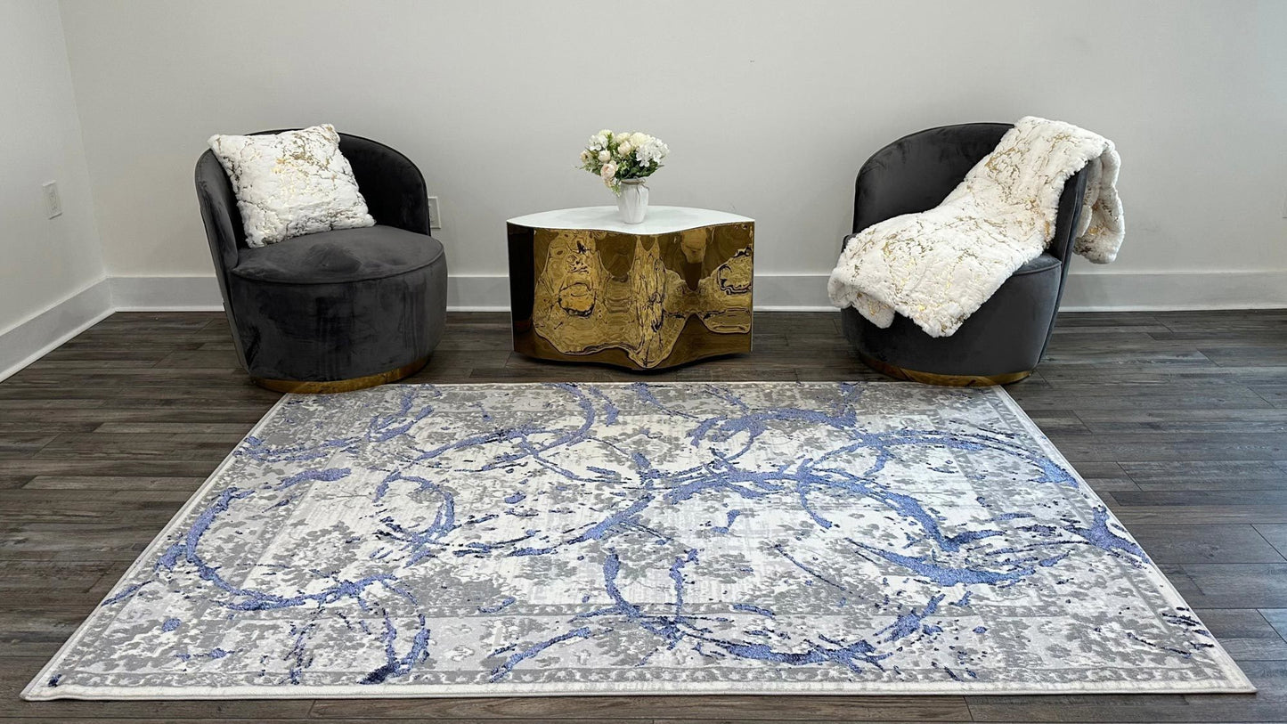 penina luxury area rug in gray with navy blue circles abstract design