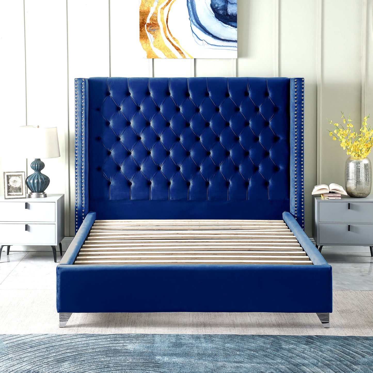 velvet upholstered bed with deep button tufting, blue