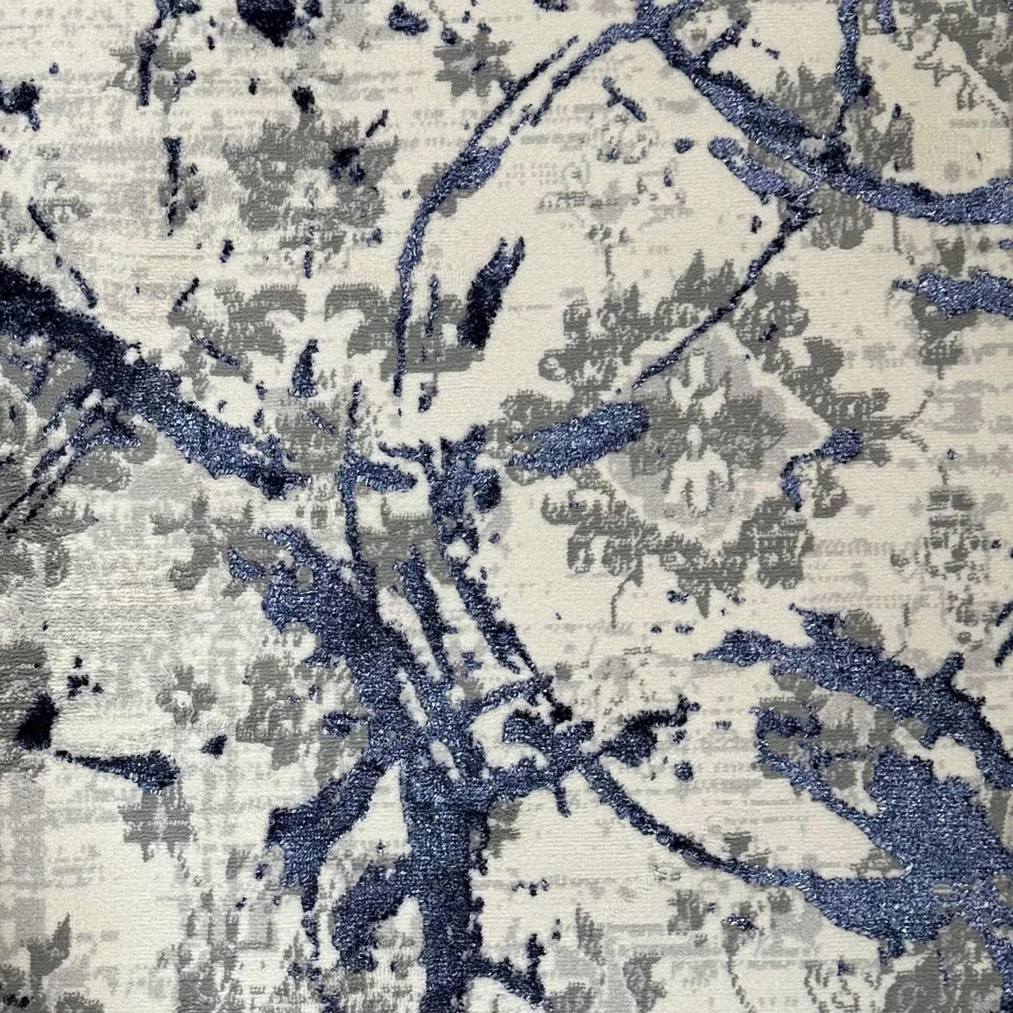 penina luxury area rug in gray with navy blue circles abstract design