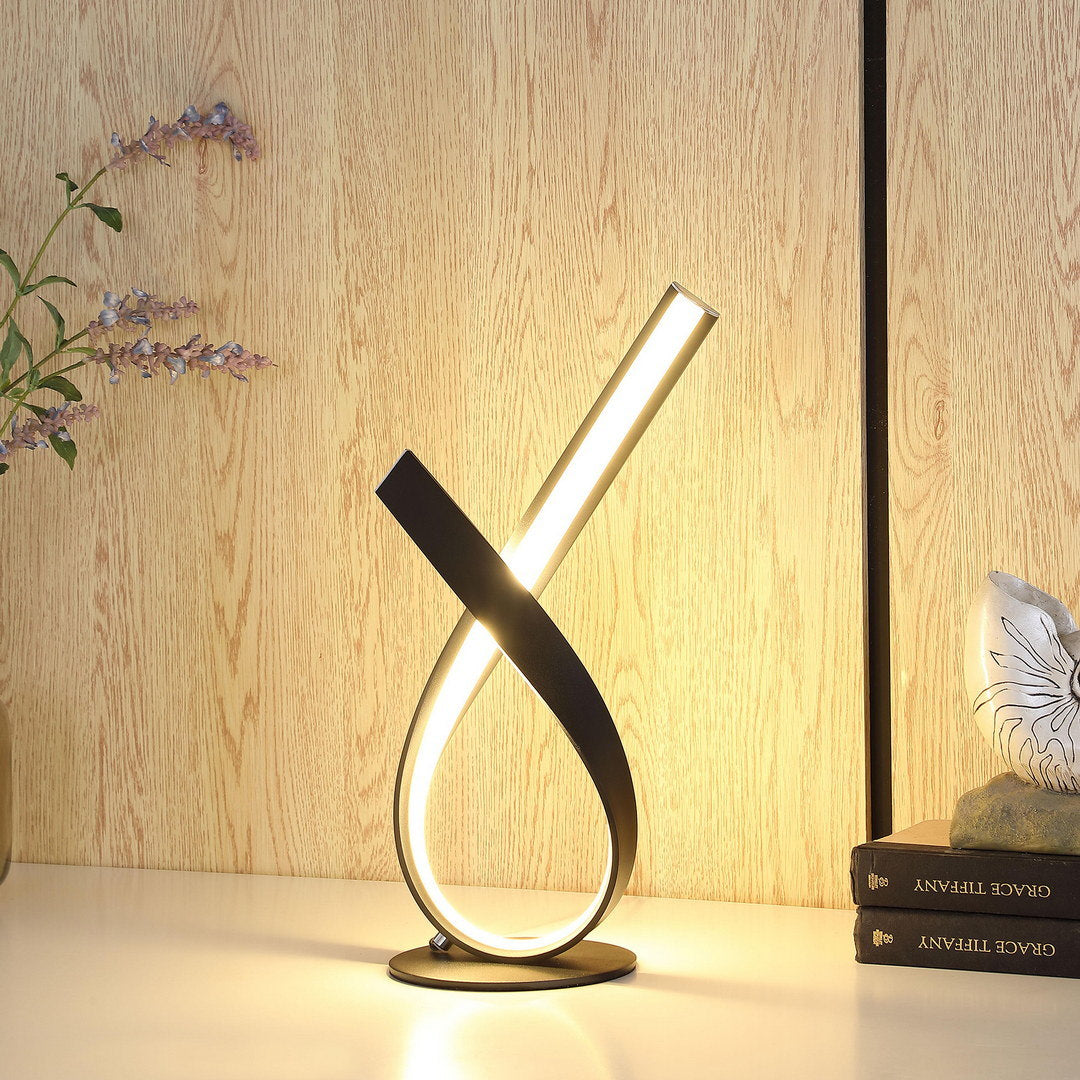 abstract upright ribbon bow led black metal table lamp
