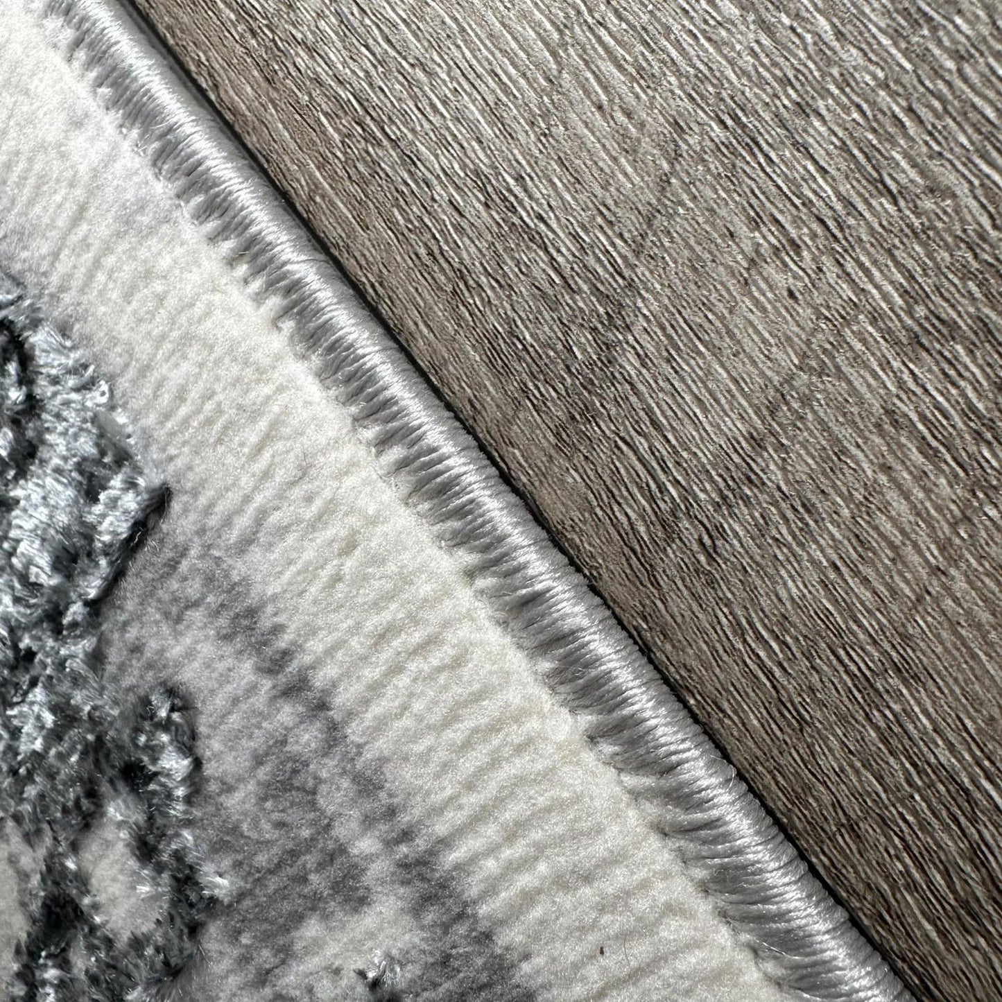 penina luxury area rug in gray with silver circles abstract design