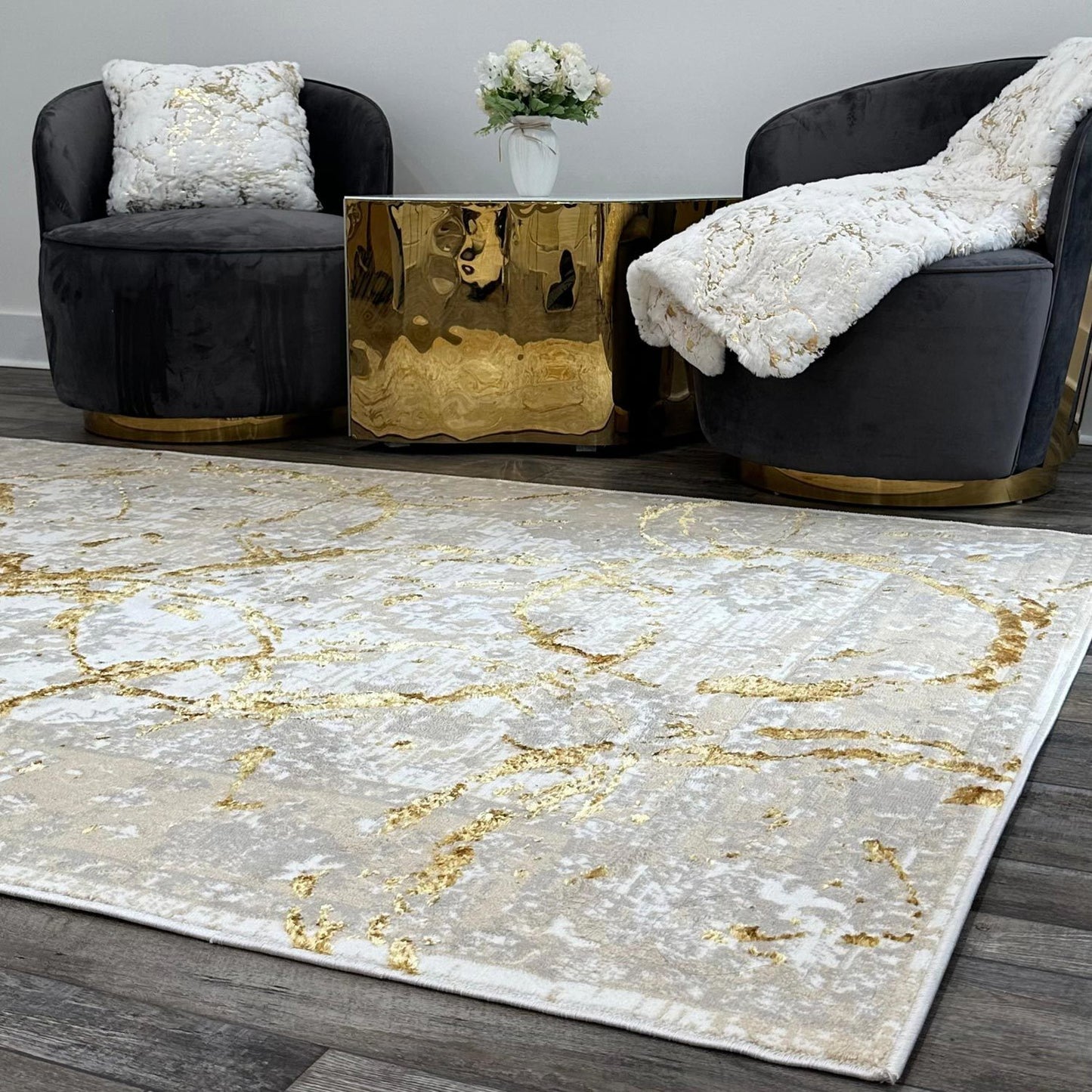 penina luxury area rug in beige and gray with gold circles abstract design