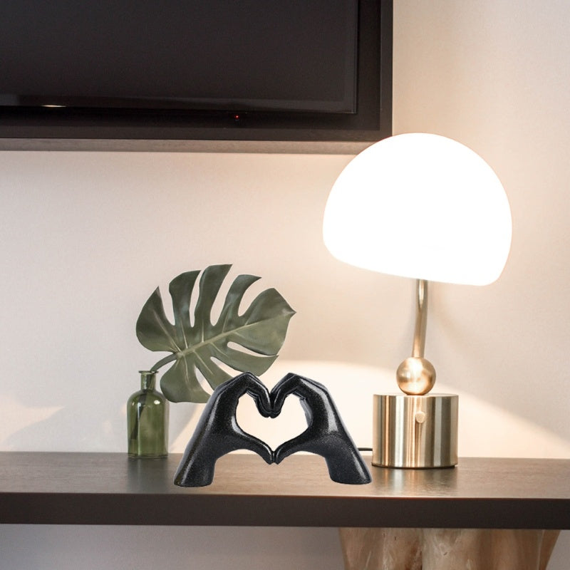 nordic heart gesture sculpture