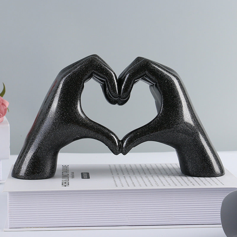 nordic heart gesture sculpture
