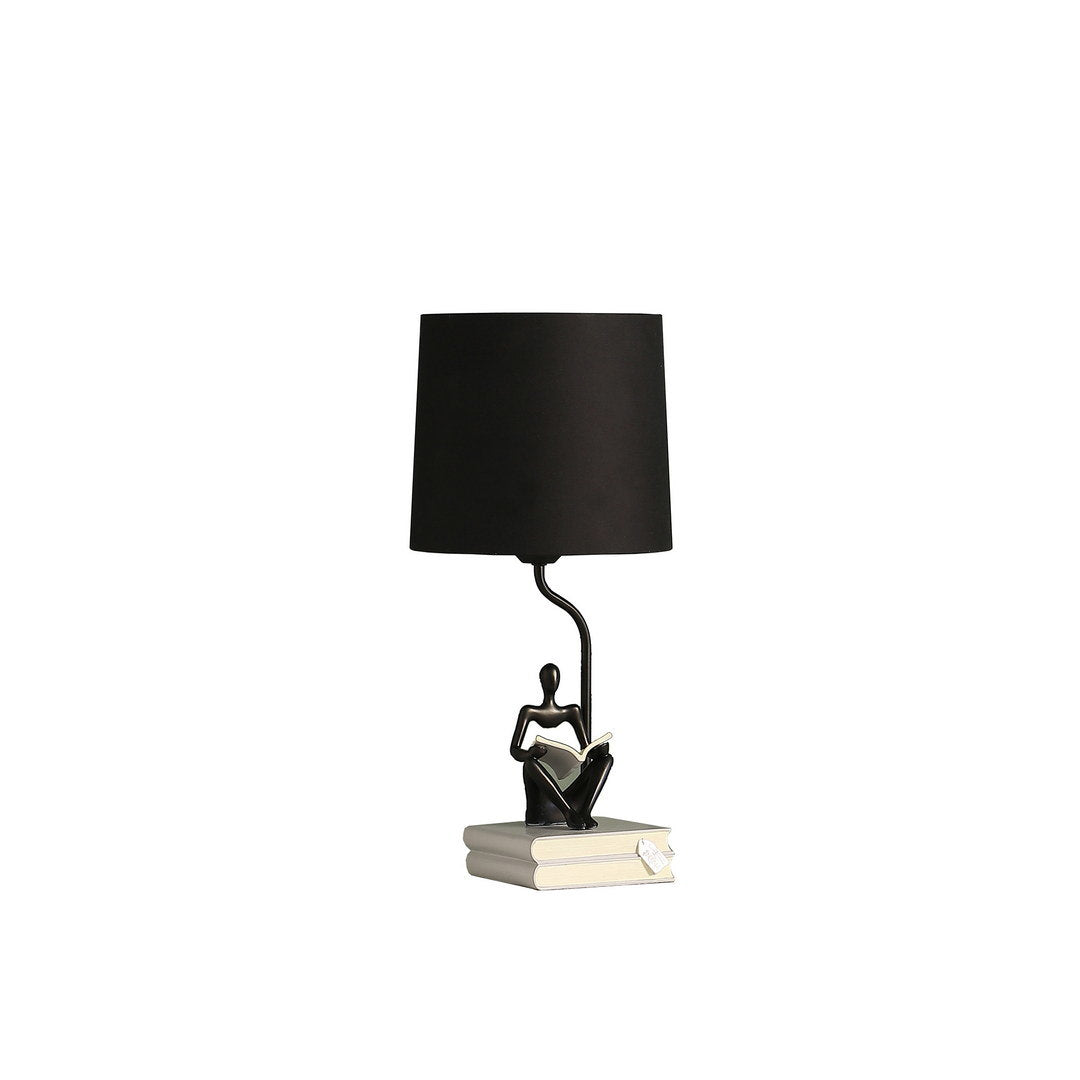 20.5" in modern reader black sitting a gray stack of books polyresin table lamp