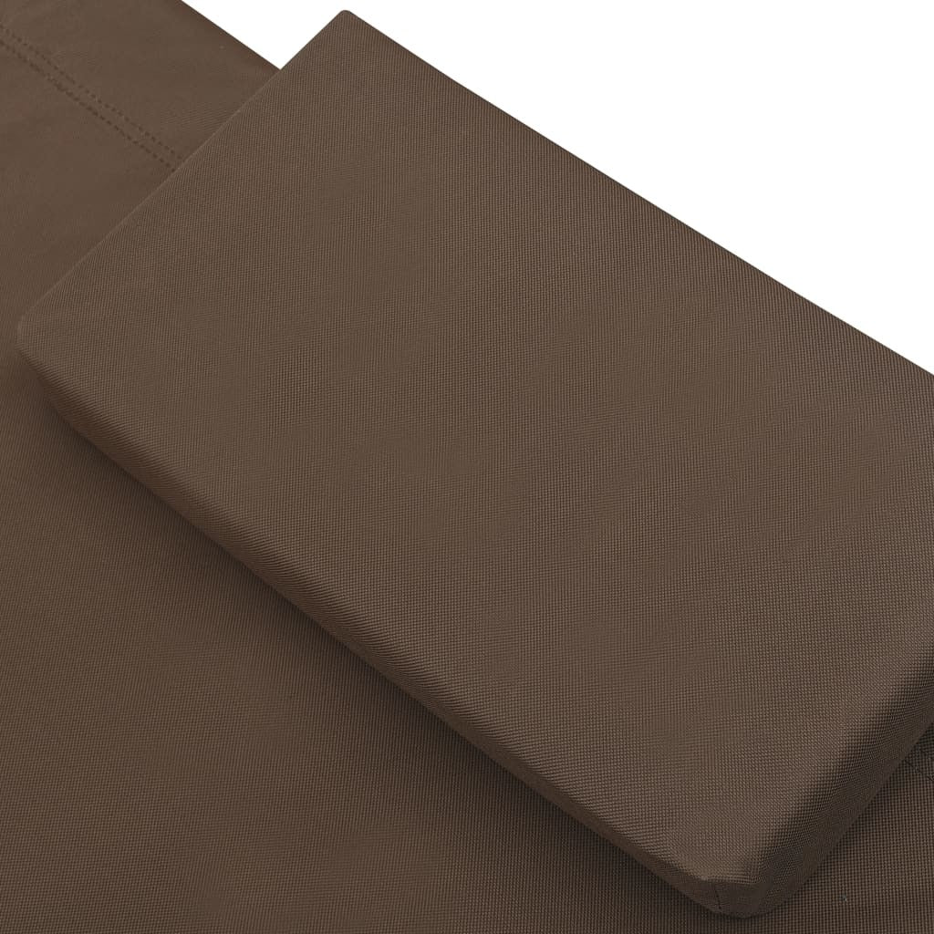 patio lounge bed with canopy and pillows brown