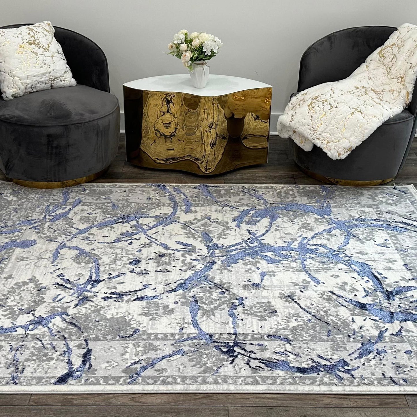 penina luxury area rug in gray with navy blue circles abstract design