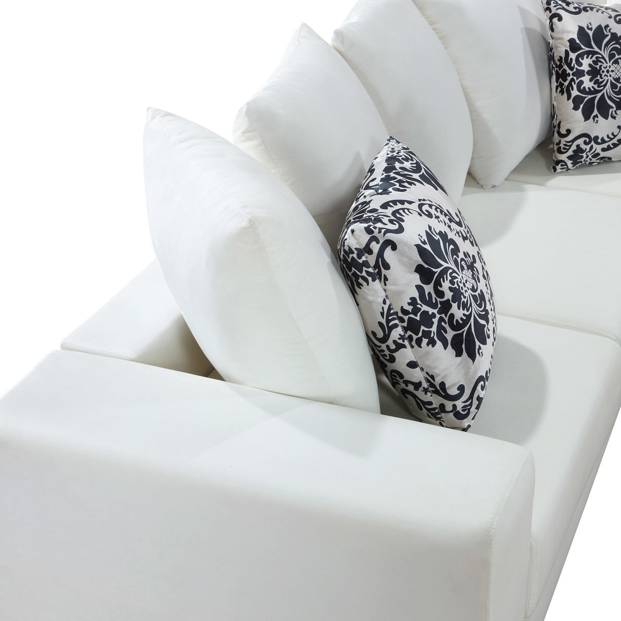 elegant velvet corner couch with lots of pillows